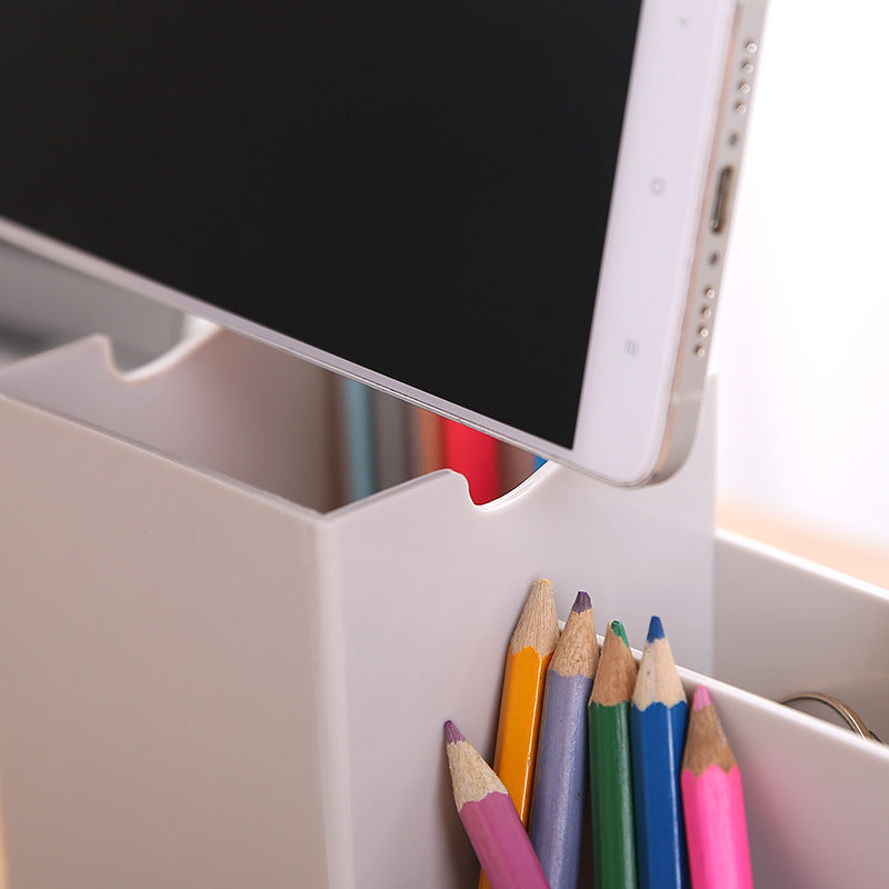 Multifunctional pen holder and remote storage box by Everyday Needs and Wants, showing a sleek organization solution for desk accessories.