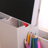Multifunctional pen holder and remote storage box by Everyday Needs and Wants, showing a sleek organization solution for desk accessories.