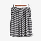 Plus size striped loose-fitting loungewear shorts from Everyday Needs and Wants, featuring a comfortable, relaxed fit and casual style.
