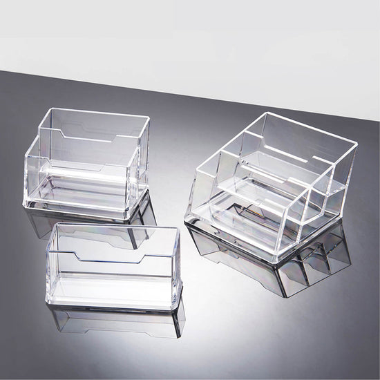 Acrylic business card holder with a creative design, featuring transparent material and modern style by Everyday Needs and Wants.