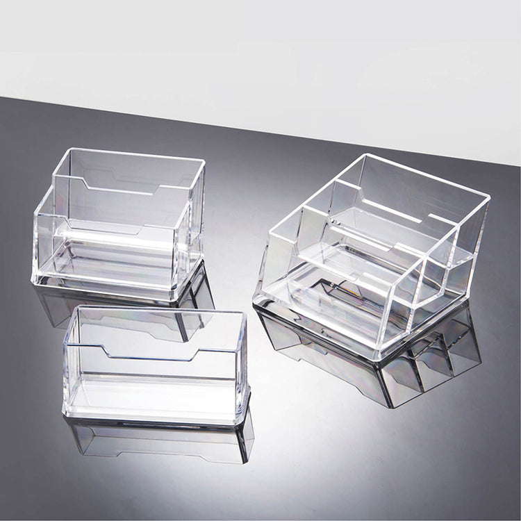 Acrylic business card holder with a creative design, featuring transparent material and modern style by Everyday Needs and Wants.
