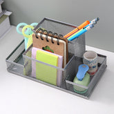 Creative Metal Four-Grid Pen Holder for office use by Everyday Needs and Wants, featuring a sleek, durable design with four compartments.