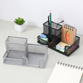 Creative metal four-grid pen holder for office use, with multiple compartments for organizing pens, pencils, and stationery.