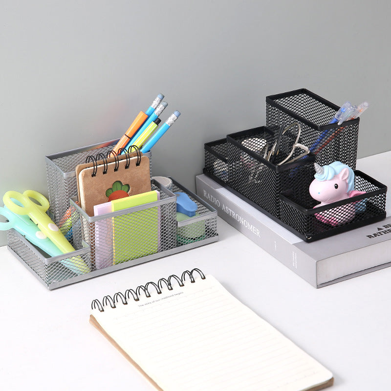 Creative metal four-grid pen holder for office use, with compartments for pens, pencils, and stationery organization.