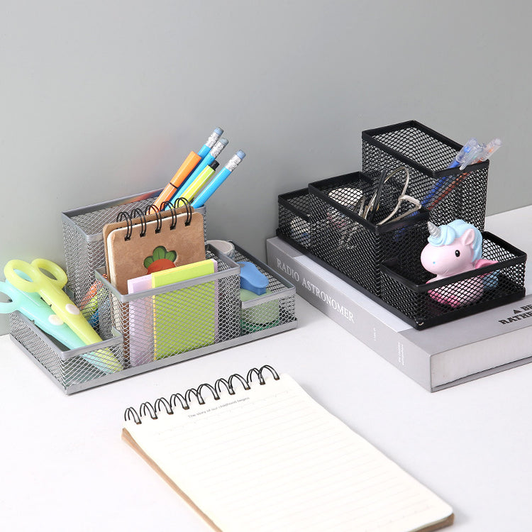 Creative metal four-grid pen holder for office use, with compartments for pens, pencils, and stationery organization.