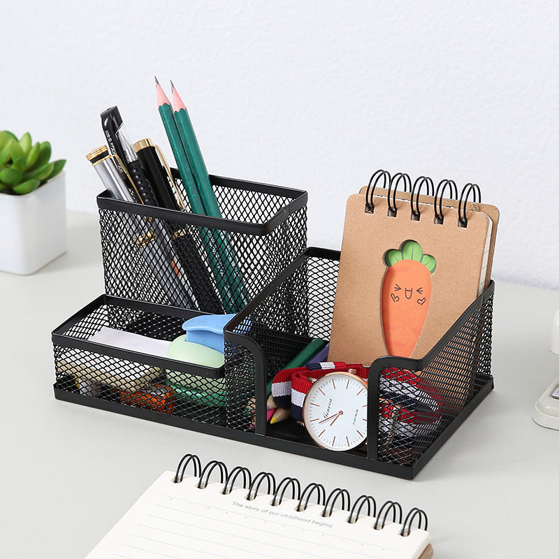 Creative metal four-grid pen holder for office use, with multiple compartments for organizing pens, pencils, and stationery.