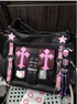 Sanrio Kitty black and pink colorblock crossbody bag with adjustable strap and cute character detail.