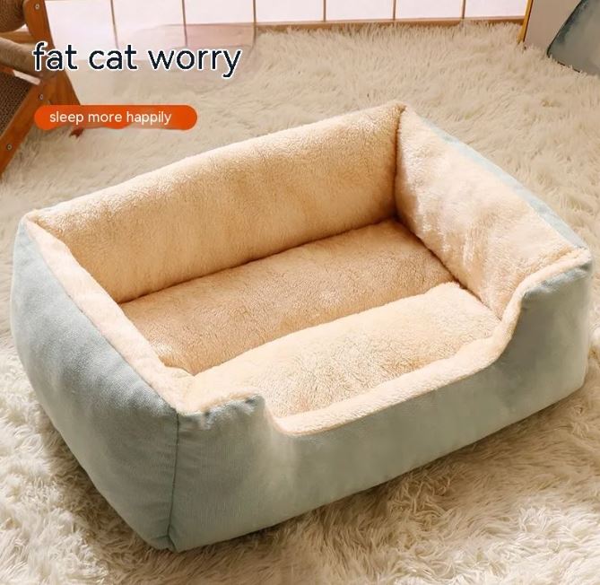 Soft, plush cat bed from My Store, designed for warmth and comfort, featuring a cozy interior and cushioned walls for feline relaxation.