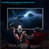 Portable HY300 Pro projector for home theater entertainment, compact design with lens and control buttons visible.