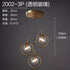 Nordic modern minimalist glass pendant light hanging from ceiling with sleek design and clear glass shade.