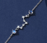Lucky Twelve Constellation Moonstone bracelet for women featuring moonstone beads and celestial constellation charms.